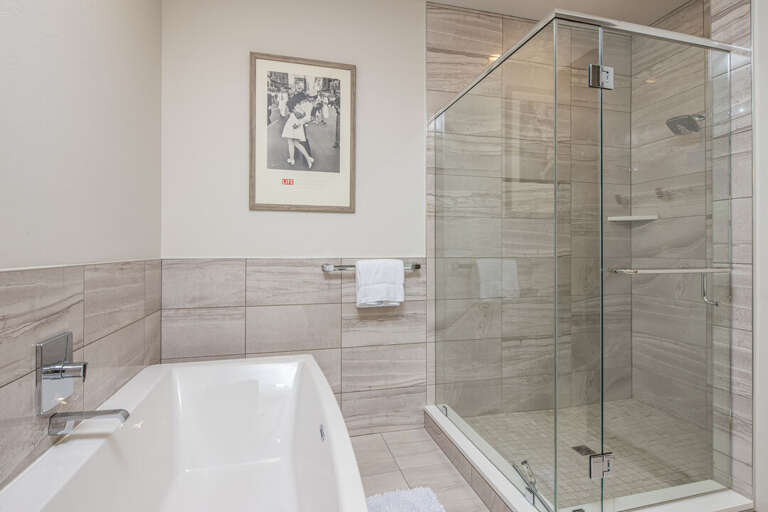 Take a bath or shower in the luxurious master ensuite | Main Level