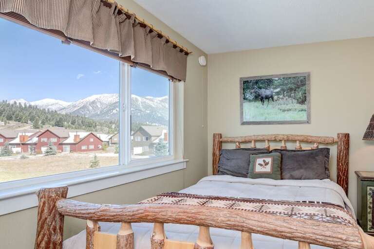 Wake up to gorgeous mountain views |  Queen-sized bed & Twin-sized bed | Upper Level
