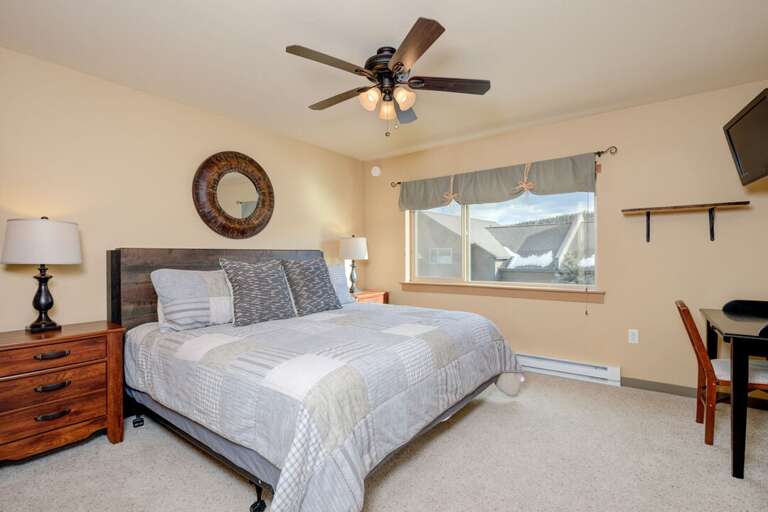 Get comfy in the king-sized bed | Upper Level Get comfy in the king-sized bed | Upper Level