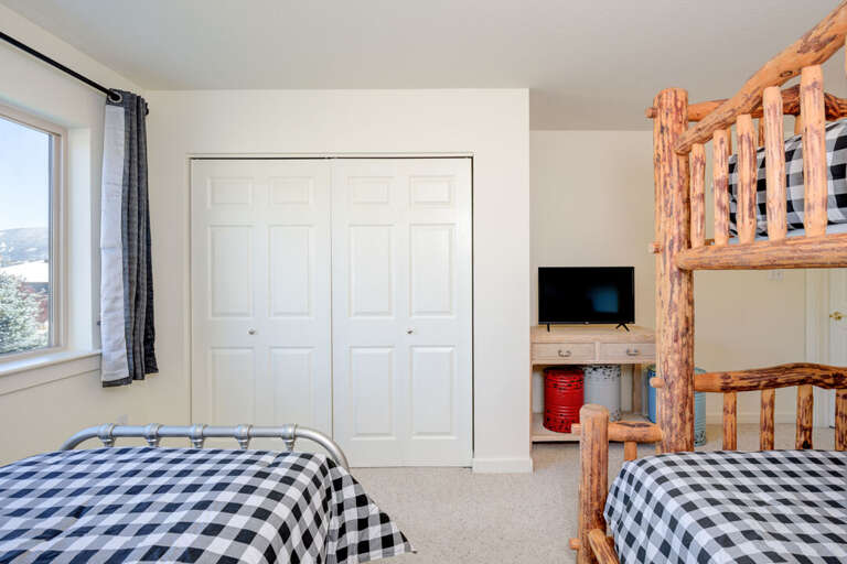 Watch a movie before bed | Bunk Bed - Twin over Queen and a Single Twin Bed | Upper Level Watch a movie before bed | Bunk Bed - Twin over Queen and a Single Twin Bed | Upper Level