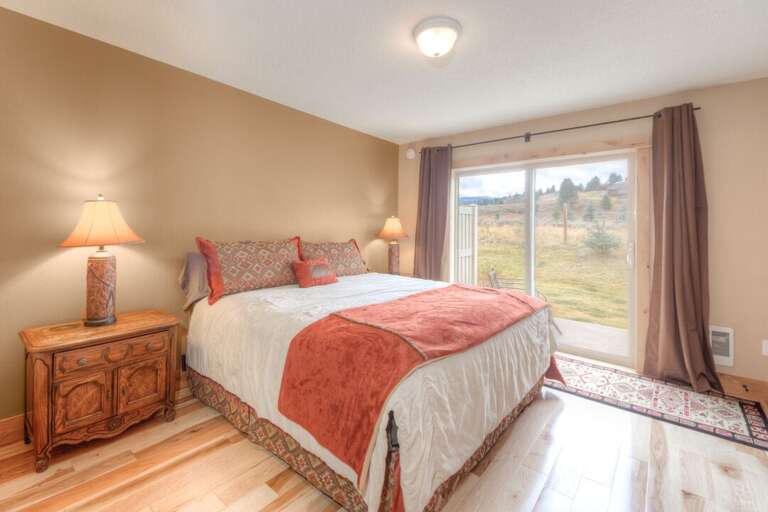 The views from this bedroom are fantastic | King-Sized Bed | Main Level The views from this bedroom are fantastic | King-Sized Bed | Main Level