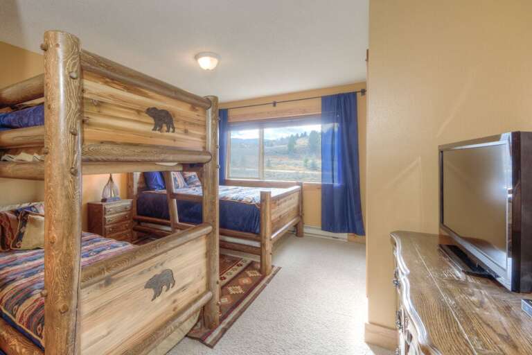 Watch a movie before bed |  Bunk Bed - Twins and a Queen-Sized Bed (3 beds total) | Upper Level Watch a movie before bed |  Bunk Bed - Twins and a Queen-Sized Bed (3 beds total) | Upper Level