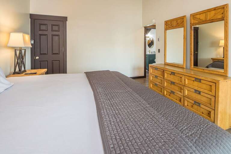 Cozy up in the king-sized bed | Upper Level