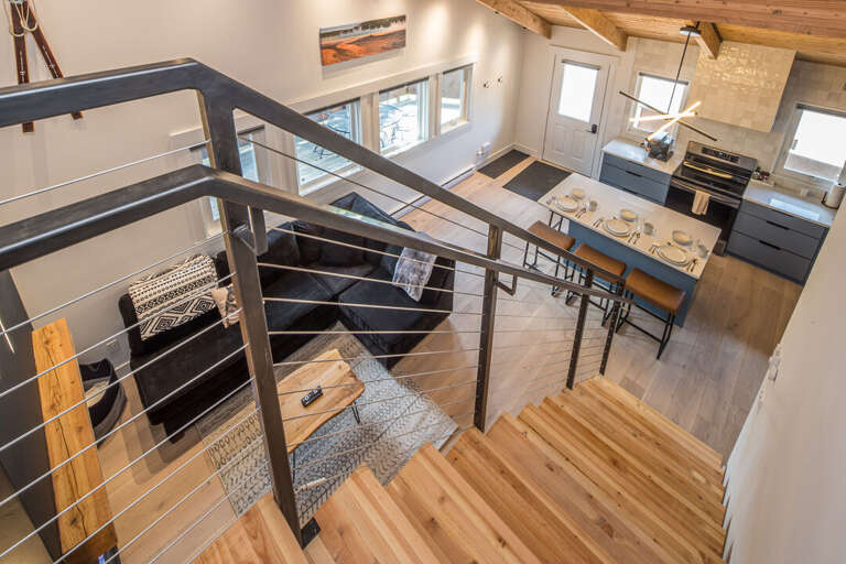 Take the stairs up to the second bedroom. Take the stairs up to the second bedroom.