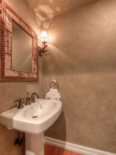 Convenient half-bathroom | Main Level