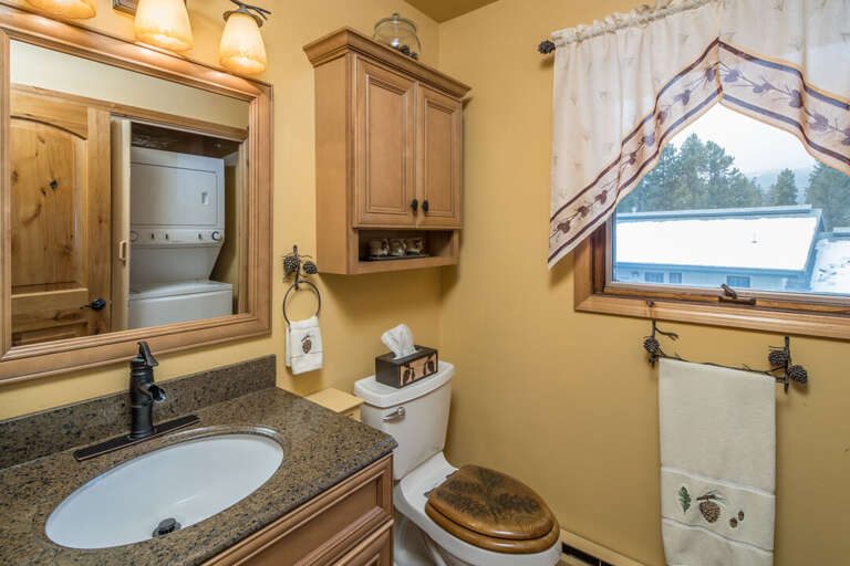 Convenient half-bath and laundry | Main Level Convenient half-bath and laundry | Main Level