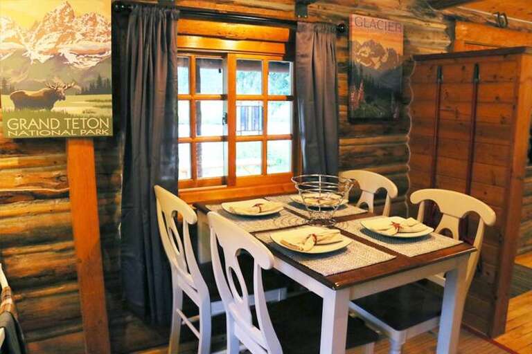Gather for a meal at the dining table with a view of the river out the window.