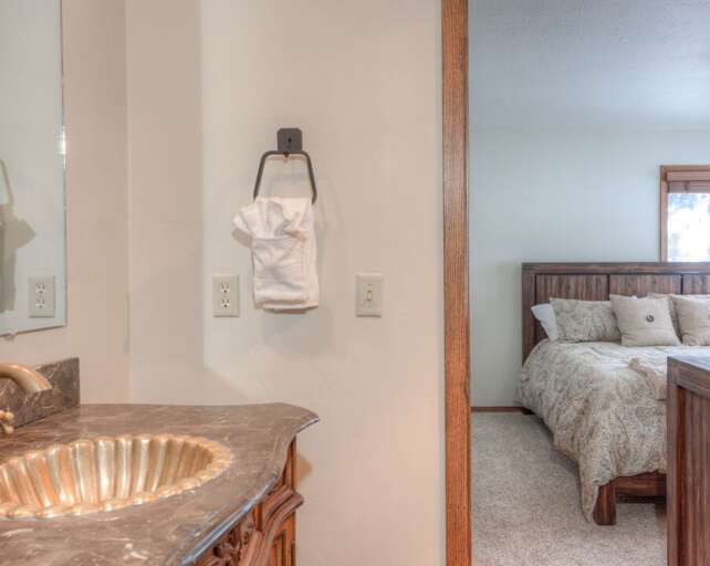 Enjoy the convenient ensuite bathroom | Lower Level