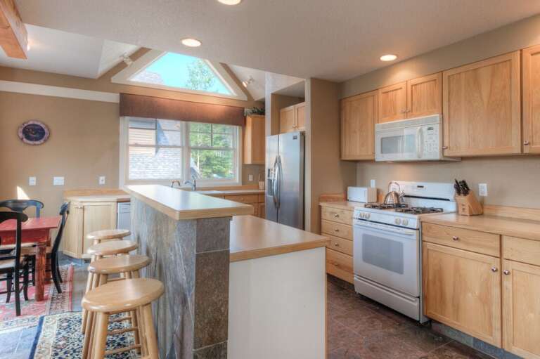 Have your morning coffee at the breakfast bar | Main Level Have your morning coffee at the breakfast bar | Main Level