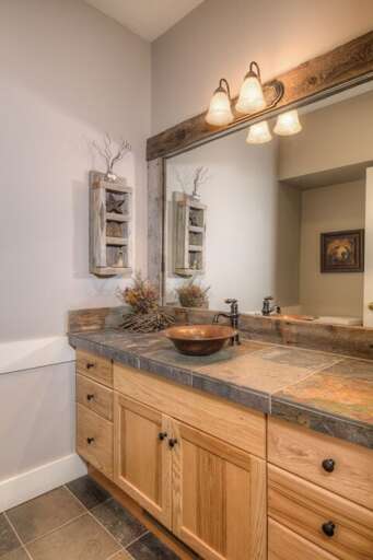 The entryway also has a convenient bathroom | Lower Level The entryway also has a convenient bathroom | Lower Level