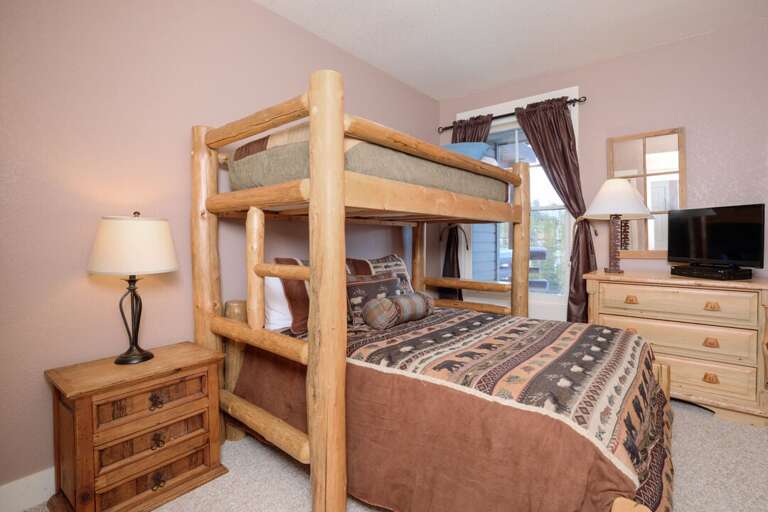 The bunk room comfortably sleeps 3 | Lower Level The bunk room comfortably sleeps 3 | Lower Level