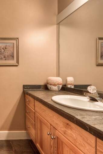A bathroom at the entrance to the home is so convenient | Lower Level