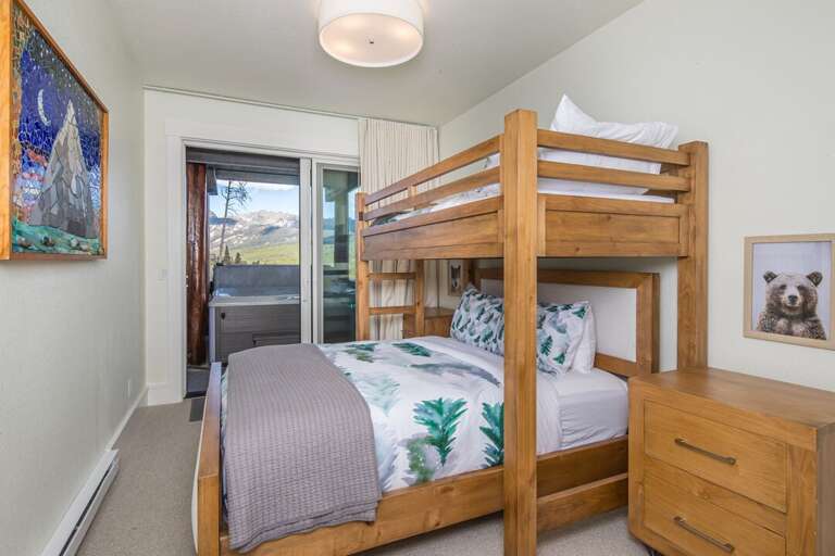 Bunk room with access to the private hot tub
