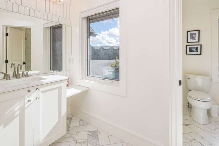 Single vanity, large open floor plan