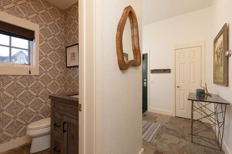 Half Bath Off Entry Way | Lower Level