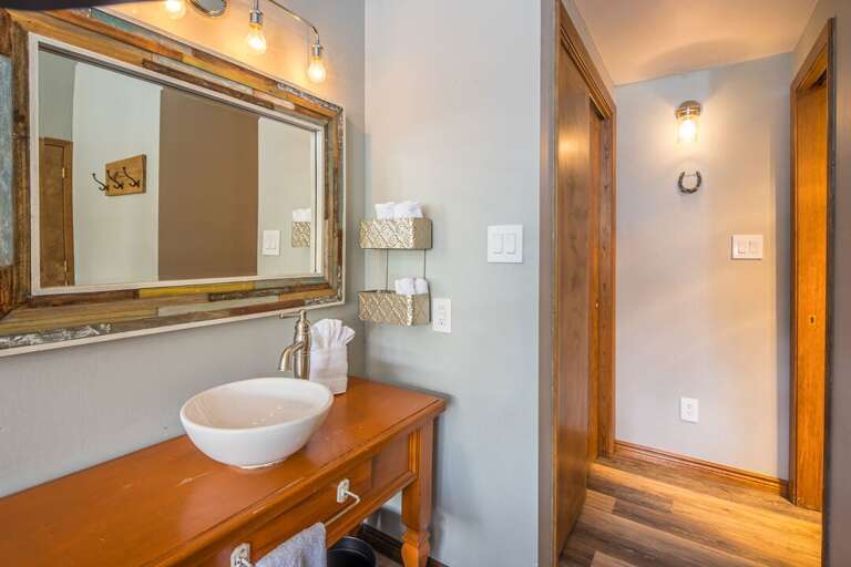 Enjoy the convenient ensuite bathroom | Main Level