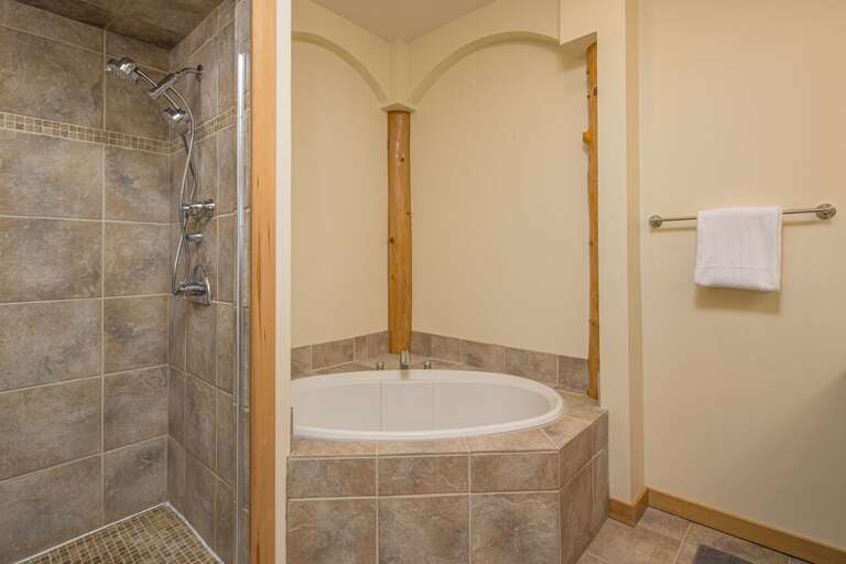 Enjoy a hot shower or soak in the tub | Upper Level
