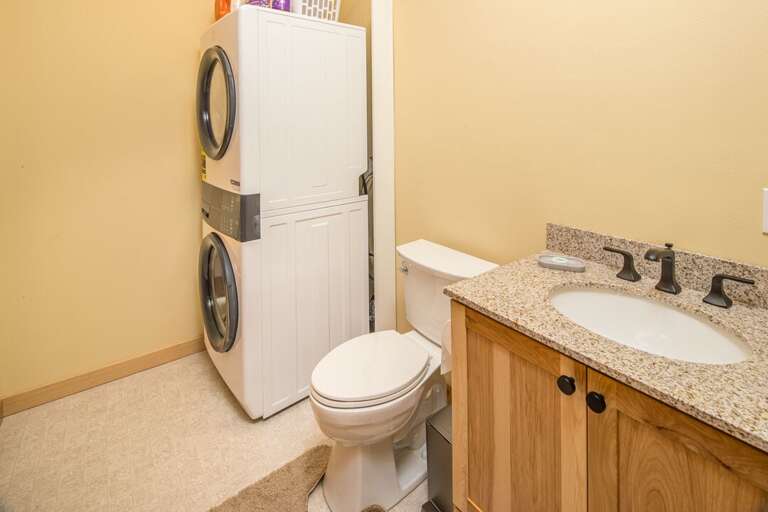 In unit laundry room with half bath | Main Level