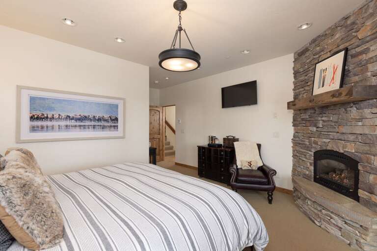 Snuggle up in bed with the fire going | Lower Level