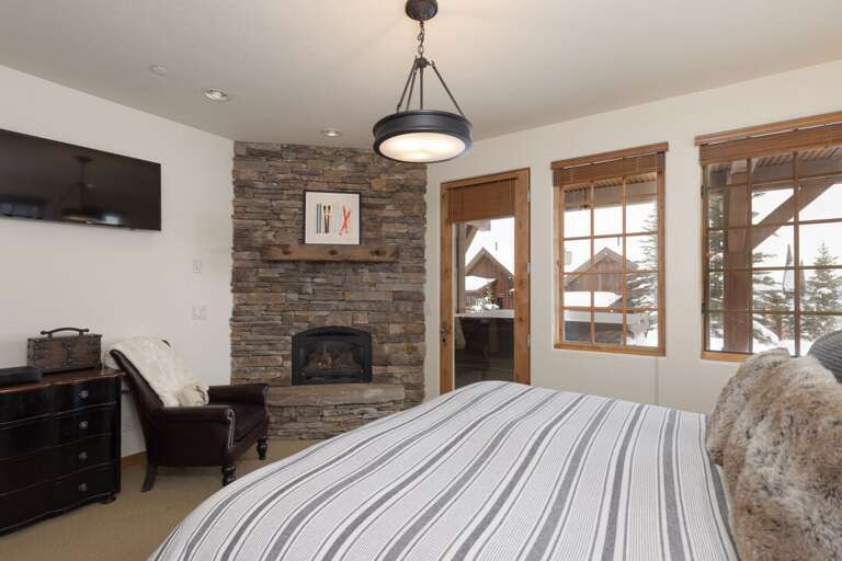 Snuggle up in bed with the fire going | Lower Level