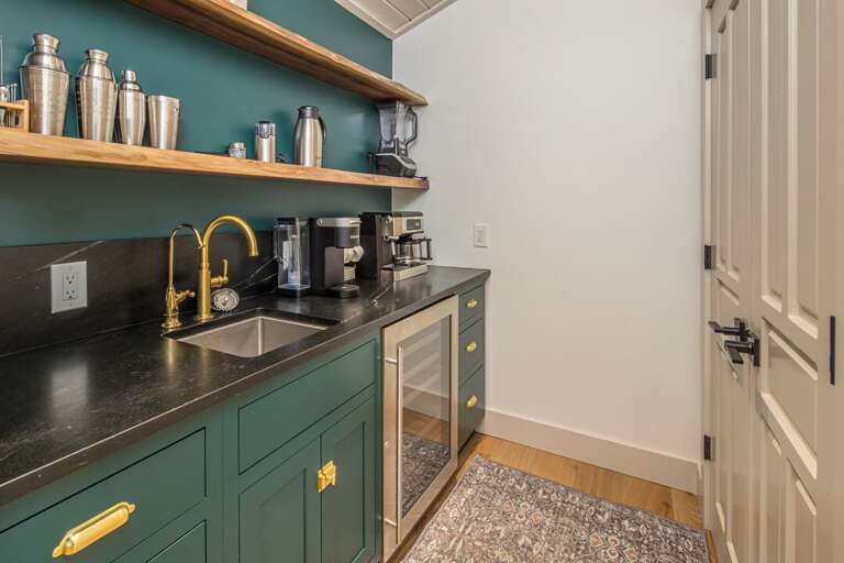 A dedicated coffee and cocktail bar stocked with everything needed to craft the perfect drink | Upper Level