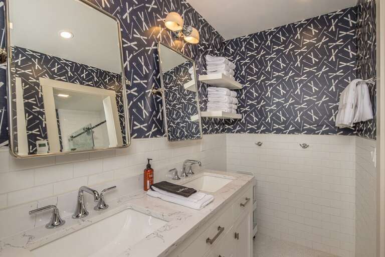 Dual vanity in the shared bathroom, right outside the queen bedroom | Upper Level