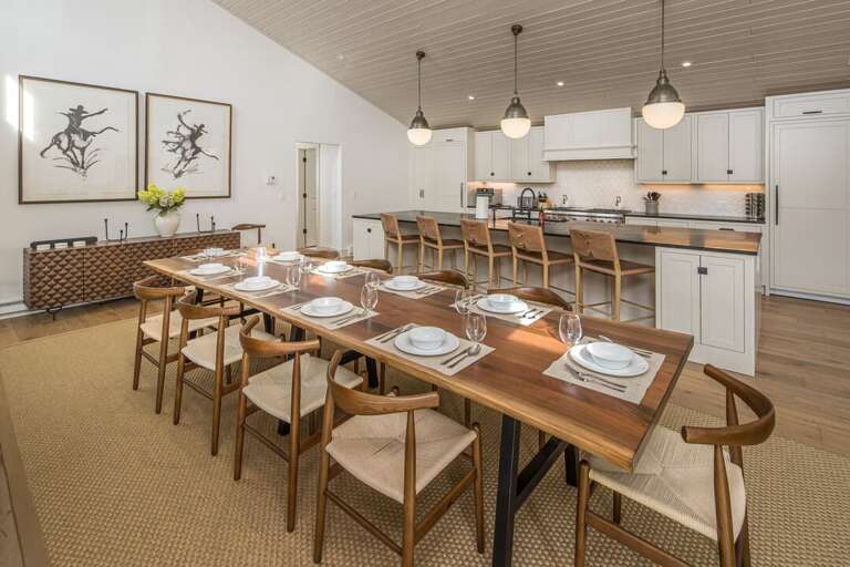 Enjoy a meal with the whole family at this table for 14 | Upper Level