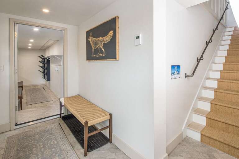 Entry way provides a great space to leave your shoes | Lower Level