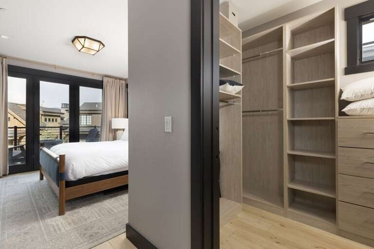 Primary bedroom walk-in closet | Main Level