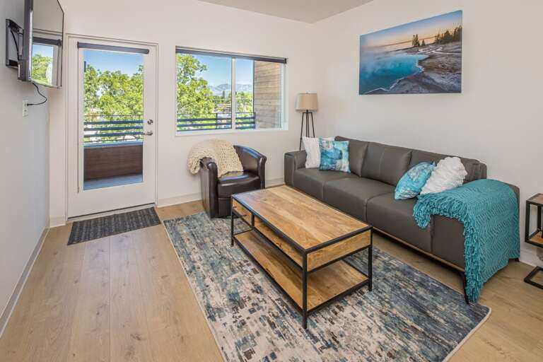 Enjoy the city views from the living room | Main Level Enjoy the city views from the living room | Main Level