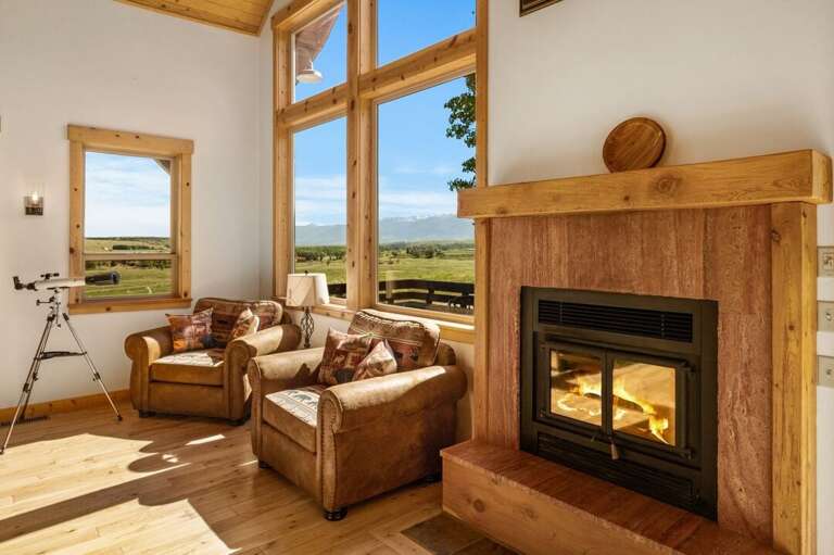 Cozy up by the fireplace | Main Level Cozy up by the fireplace | Main Level