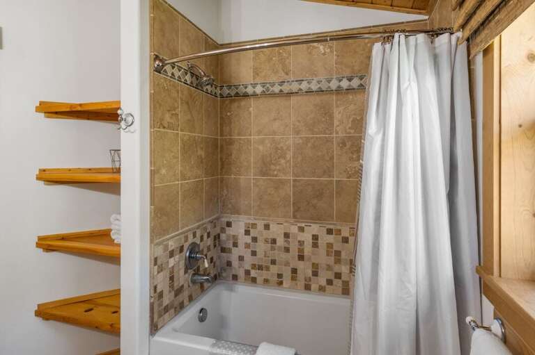 Enjoy a shower or bath | Upper Level Enjoy a shower or bath | Upper Level