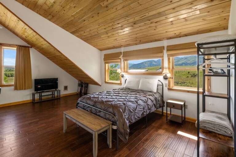 Enjoy TV from the bed | Guest Suite | Upper Level Enjoy TV from the bed | Guest Suite | Upper Level