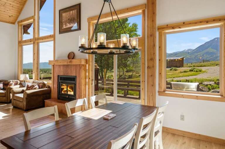 Enjoy the warmth of the fireplace while eating a meal | Main Level Enjoy the warmth of the fireplace while eating a meal | Main Level