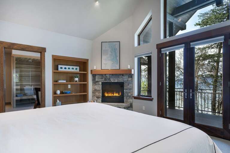 Master Bedroom 2 is located on the main level with a private patio! | King Bed