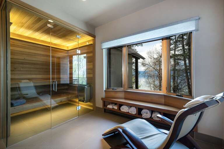 Master Bedroom 2 offers a private sauna with lake views!