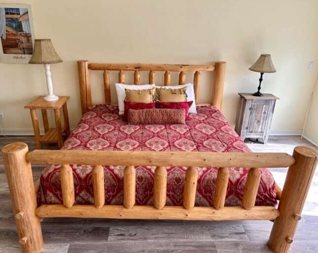 Cozy up in the king-sized bed | King Bed | Main Level Cozy up in the king-sized bed | King Bed | Main Level