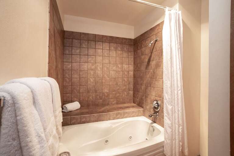 The jetted tub is relaxing after a long day of adventuring | Upper Level