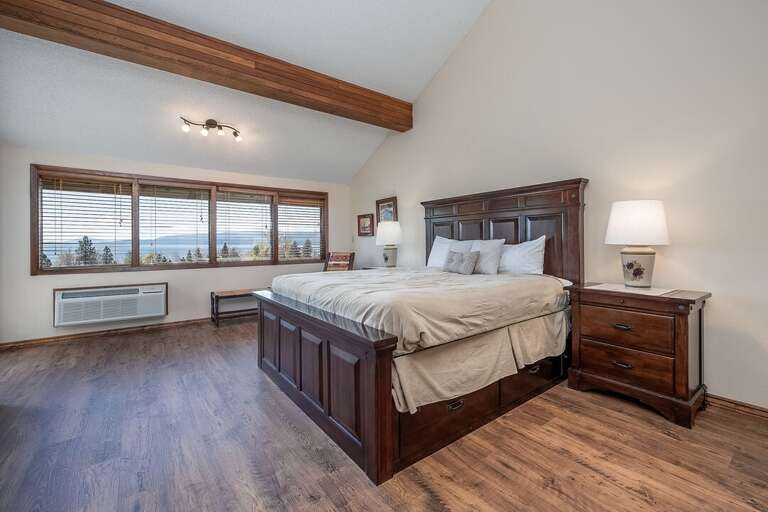 The primary bedroom has a comfy king-sized bed | Main Level