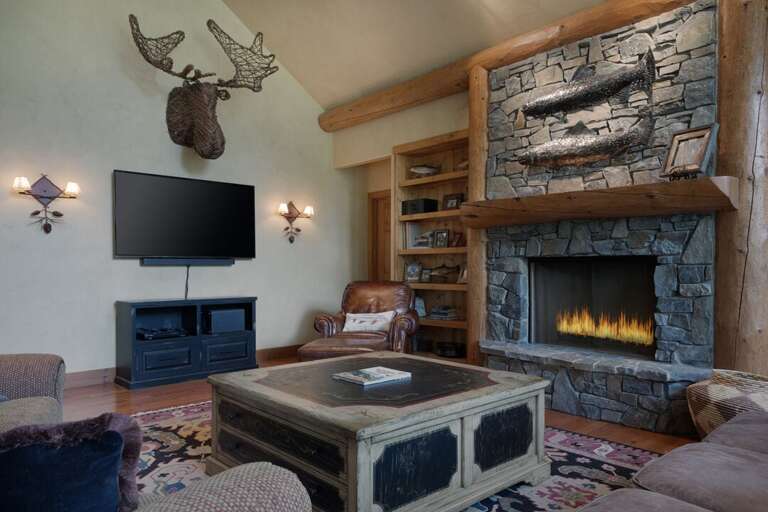 Watch a movie and enjoy the warmth of the fire