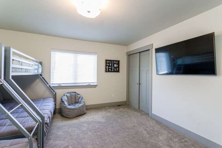 Bunk room w/ TV | Two Sets of Twin-Over-Double Bunk Beds Bunk room w/ TV | Two Sets of Twin-Over-Double Bunk Beds