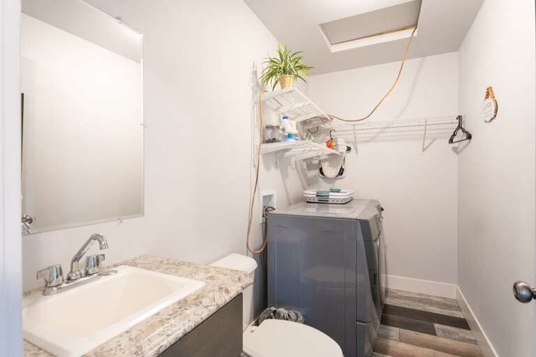Half Bathroom and Laundry Room | Upper Level