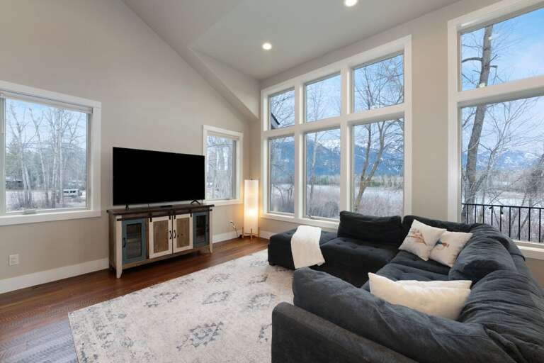 Enjoy a Movie or the Views From the Living Room | Upper Level