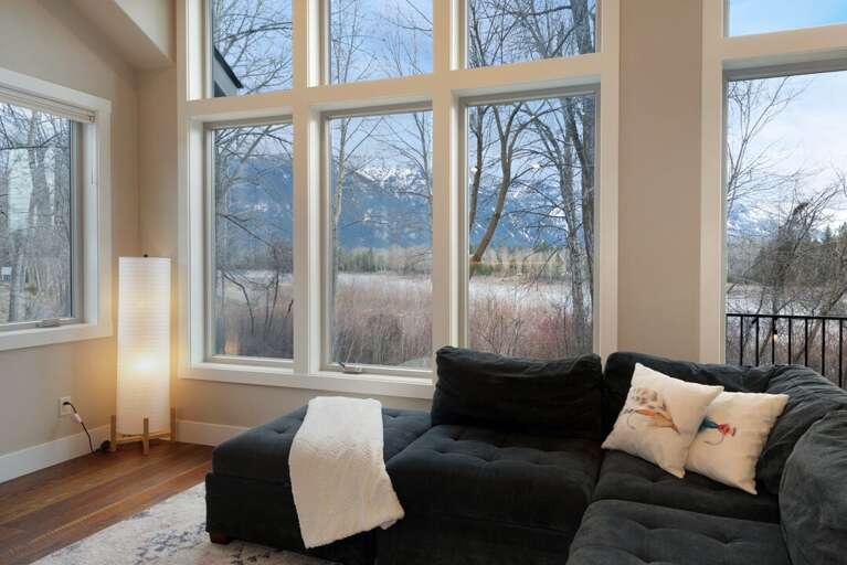 Floor to Ceiling Windows Allow in Natural Light | Upper Level