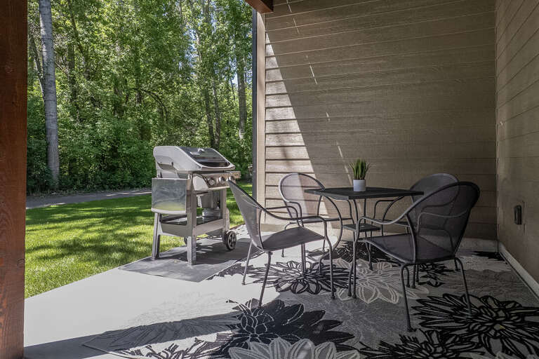 Patio with Seating and a Grill | Exterior