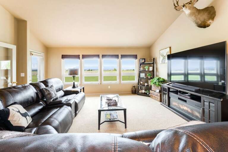Cozy up on the large sofa and watch a movie | Main Level Cozy up on the large sofa and watch a movie | Main Level