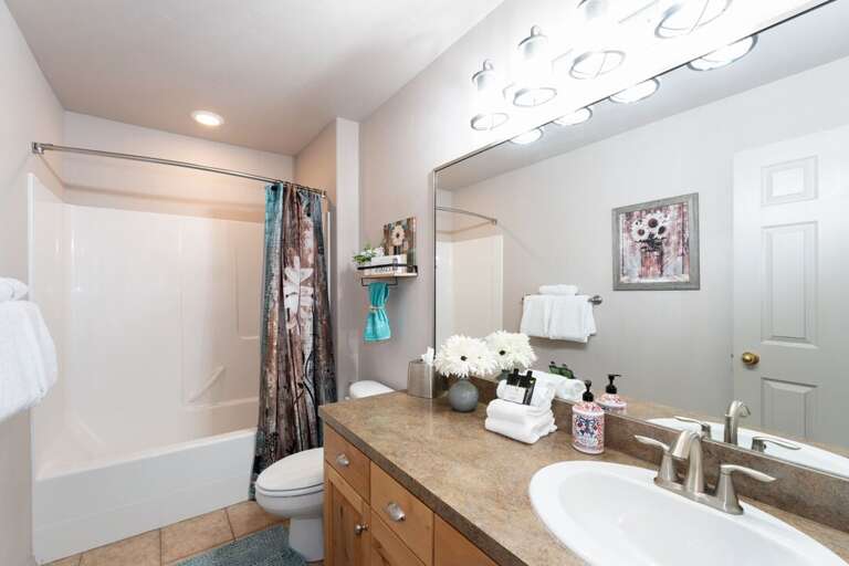 Shared Bathroom with shower/ tub combo | Main Level Shared Bathroom with shower/ tub combo | Main Level