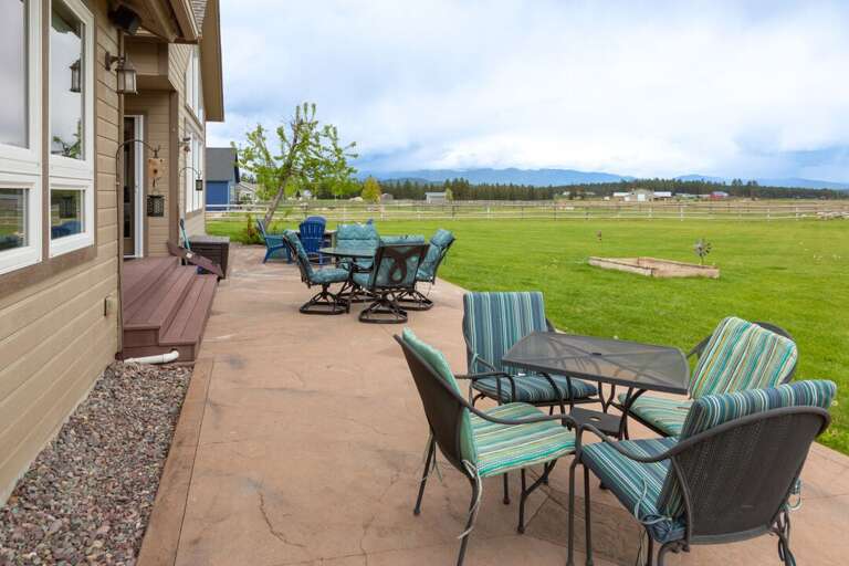 Spacious patio with three different seating options to enjoy the outdoors | Exterior Spacious patio with three different seating options to enjoy the outdoors | Exterior