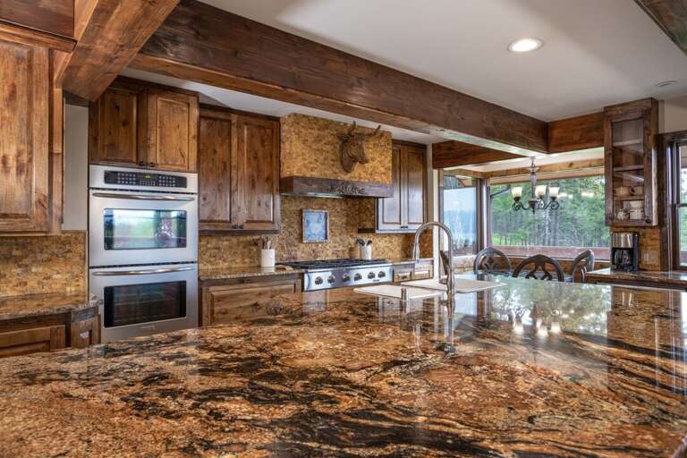 Have a charcuterie night on this spacious island | Main Level