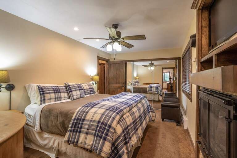 Watch a movie in bed | King Bed | Main Level